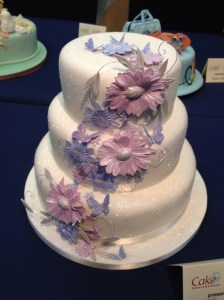 Cake International purple flower tier cake