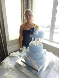 Bridesmaid and wedding cake