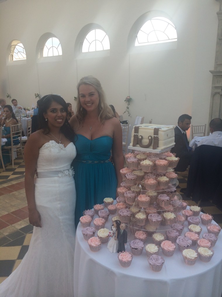 cupcake and suitcase wedding cake